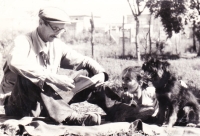 Father Alexander reads to his granddaughter, early 1960s.
