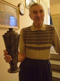 Rudolf Révay with one of the three cups that he still has, 2023