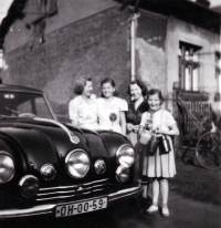 Ingeborg Larišová ( in the front in a pioneer scarf) with her mother, sister and aunt, Ostrava, Šalamoun mine colony, circa 1952