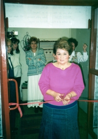 Saying goodbye to her colleagues at work, year 1996 