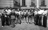 Jan Klus (third from left) / handing over the prizes for victory in a basketball game / Český Těšín / 1948