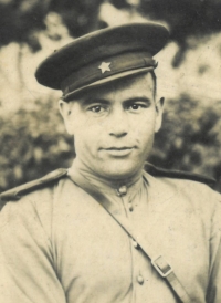 Father Mykhailo Vasylovych, headmaster of the school, wearing an artilleryman's uniform