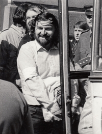 Pavel Wonka exiting the prison, with Hana Jüptnerová behind him, circa 1987