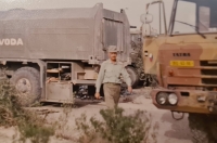 Jan Josef near water transport trucks, close to Kuwait, 1991