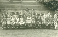 Mrs. Ťukalová in the school photo (in the first row, sixth from the left)