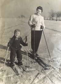 With mother on skis, 1950s
