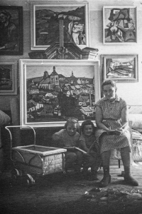 Vlasta Matoušová with her mother Ludmila and her sister Milada in front of her father Dalibor Matouš's paintings in 1957
