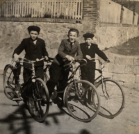 Boys from Ondřejov on their bicycles, Václav Vycpálek in the middle, 1930s