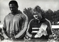 Taťána Netoličková and Luis Delis, Cuban discus thrower, during announcement at the P-T-S meeting in Bratislava. Around 1983