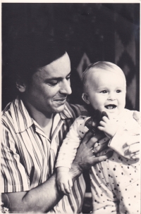 1976, with his father