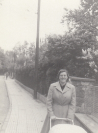 Ludmila Klinkovská with her daughter Eva in a stroller on Tyrš's waterfront in Zlín, 1952