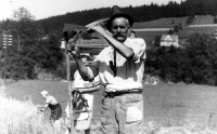 Anna Krpešová's grandfather, Karel Frič, her mother and grandmother, haymaking, Staré Hamry, the WWII era 