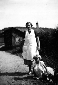 With her mother, Anna Duží, and Asta, her St. Bernard, Staré Hamry, around 1935 
