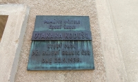A memorial plaque on the Czech school building to Otakar Kodeš, the victim of unrest in the border region. The teacher and school librarian volunteered as a member of militia ("Stráž obrany státu") and went to defend the neighbouring village of Heřmanice.