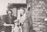 With parents, ca. 1943