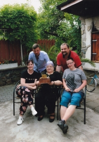 Marta Mezerová with her grandchildren, 2023