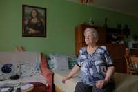 Drahomíra Starobová in her apartment in Nová Bělá with a picture of the Mona Lisa, which she hand embroidered