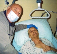 Michal Virák with father in hospital