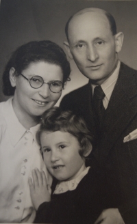 Zuzana as a child, with her parents, father František and mother Magda.
