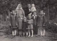 All siblings with the parents, Františka Řezáčová on the far right, sister Marie on the far left