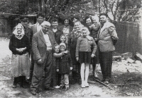 Zdeňka Dostálová’s family: grandmother Leopolda Navrátilová is front left, father František Dostál, daughter Zdeňka standing in the forefront with a handkerchief, and Josef and Zdeňka Dostáls, Otaslavice, 1961