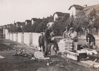 Construction of the Lidový dům community centre, circa 1930, with residential development in the background