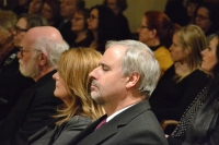 Author's evening, Pavel Trojan next to his wife, artist Karel Demel in the background, January 2019