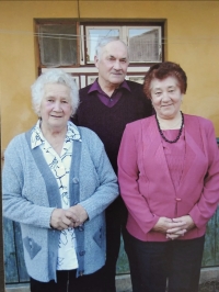 Oľga Domanická (right) with her older sister and brother