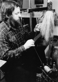 Jaroslav Prášil at the distaff and spinning wheel, 1980s