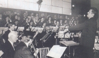 Miroslav Vítek (forefront) with a symphony orchestra