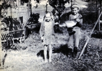 Ludmila Jahnová with her brother and fish / around 1957