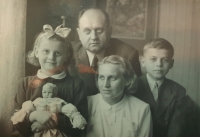 Jiří Bartůšek with his parents and sister