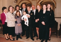 The christening of grandson Michael (in the arms of Václav Havel) in the U Salvátora Church, Darja second from the left