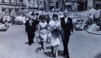 Jindřich Marek with his newlywed Libuše in 1964 after the wedding at the renovated Jablonec town hall. They walk along Mírové náměstí.