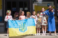 An event organized by the “My Dad Defends Ukraine” charitable society. Amet’s daughter Kamila playing the violin, 2023
