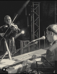 Yaroslav Yarovenko and Pavlo Hots performing with the NAZVA band. Kyiv, 2023
