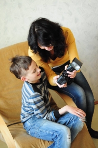 Kateryna Ptakha with her son Vladyslav at a photography course, 2011