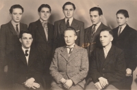 With his father (seated in the middle) and his colleagues (witness standing on the far right), 1942