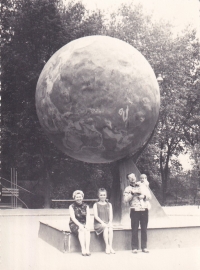 Natalia Vyshnevska in her father's arms in the centre of Kyiv near the former planetarium, 1970.
