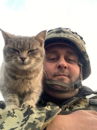 On guard duty with a cat. Luhansk region, May 2022