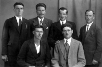 Group photo of men from Kobeřice who worked in Germany between the wars, on the far right Alfons Stříbný, father of the witness, on the bottom right Vilém Rycka, brother-in-law of Alfons, later they were together in the same unit