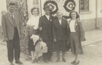 Photograph with family, witness is on the right