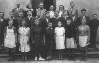 Marie Obrusníková (second right with braids) at school, Kobeřice, circa 1950