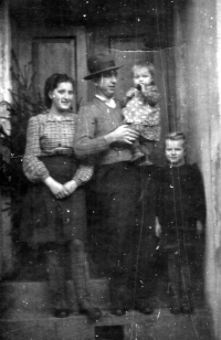 Marie Obrusníková with her father, little brother Jan and Jana Šímová, Kobeřice, circa 1944