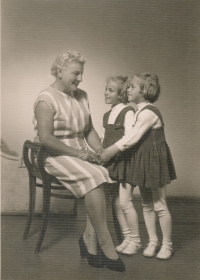 With her daughters in the 1950s