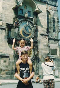 Zvjezdana Marković. Srdjan and Andrea in front of the Astronomical Clock. Prague 1994