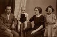 With parents and brother, 1943