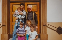 Pavel Husák with children visiting the persecuted priest Pavel Zíbal, 1980s