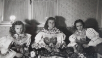 Sister Marie, friend Eva and a witness in folk costumes during the World War II