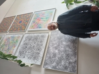 Aleš Svoboda with his paintings